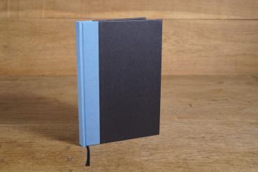 Writing and notebook black, with light blue linen